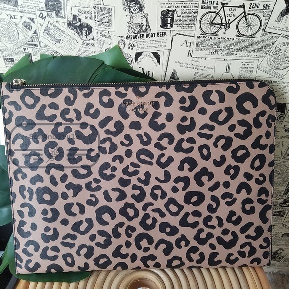 kate spade Handbags - Kate Spade NWT staci graphic leopard l-zip universal laptop sleeve up to 15"